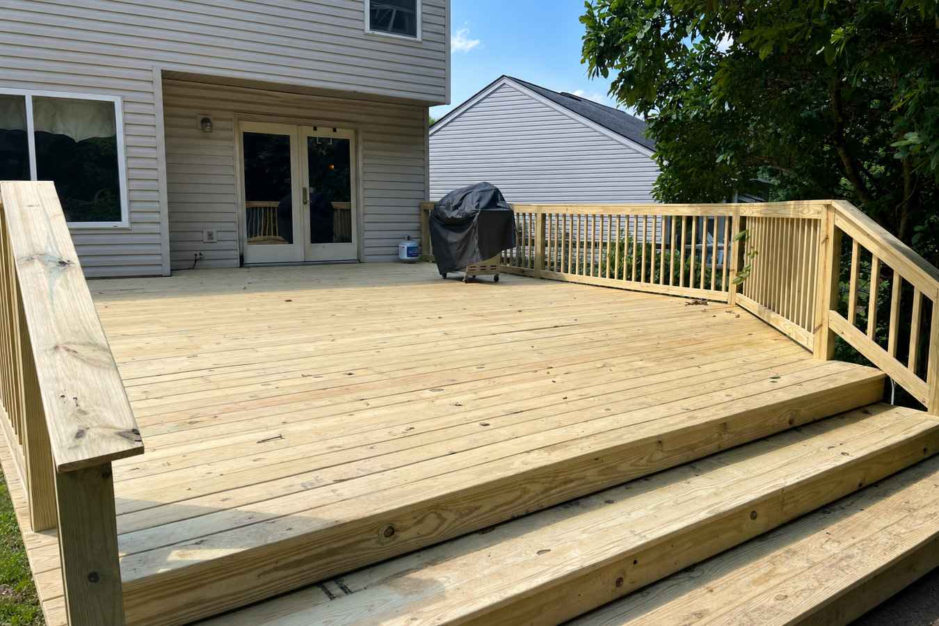 Pressure-treated wood deck construction